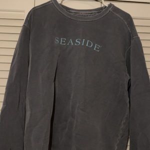 Seaside, FL powder blue sweatshirt with teal lettering